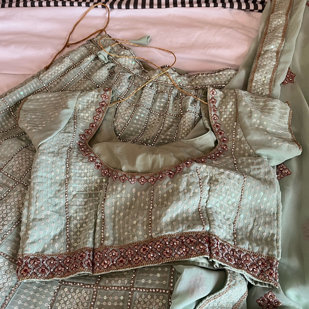 Elegant Women's Blouse in Soft Green with Embroidery